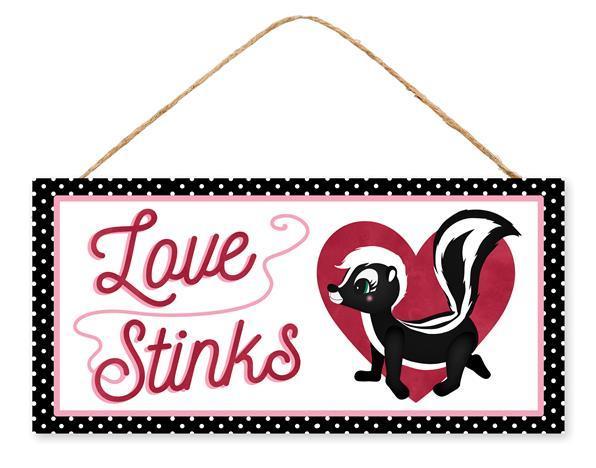 AP7170    12.5"L X 6"H Love Stinks/Skunk Sign    White/Pink/Red/Black